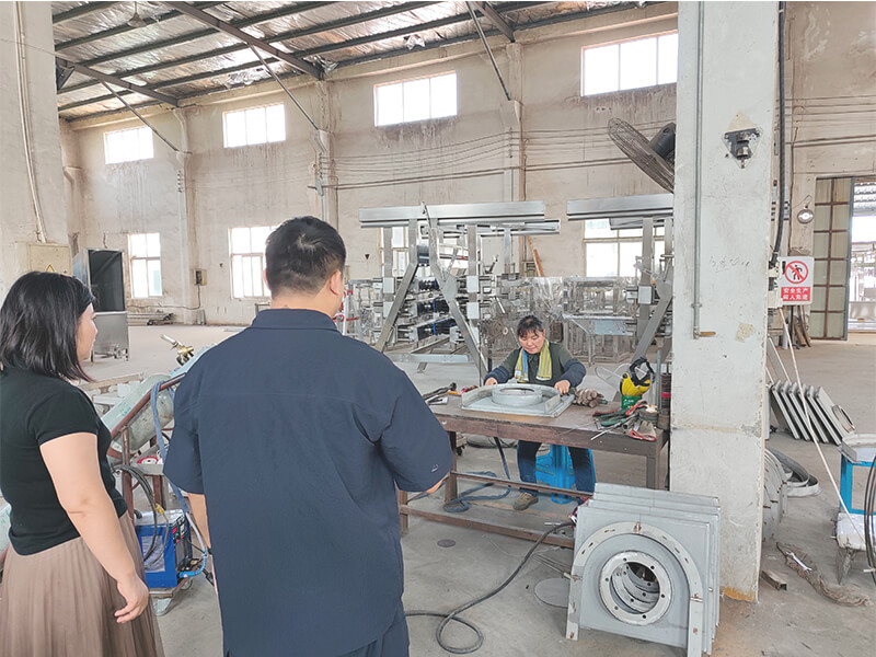 Third-party auditor inspecting poultry processing equipment at HW Machinery Nanjing